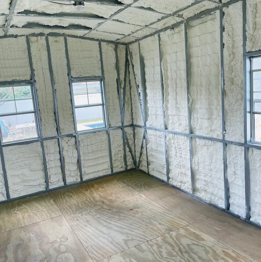 Closed-cell spray foam insulation applied to wall cavities in a residential project in Oscoda